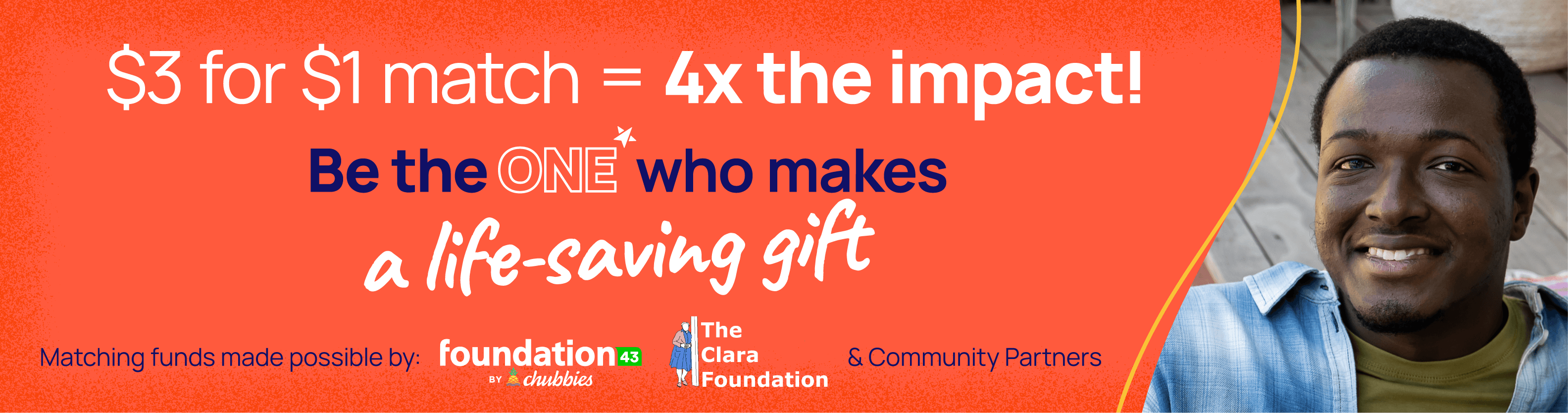 An LGBTQ+ young person in a checkered blue and white collared shirt, smiling. Be the one who makes a life-saving gift.