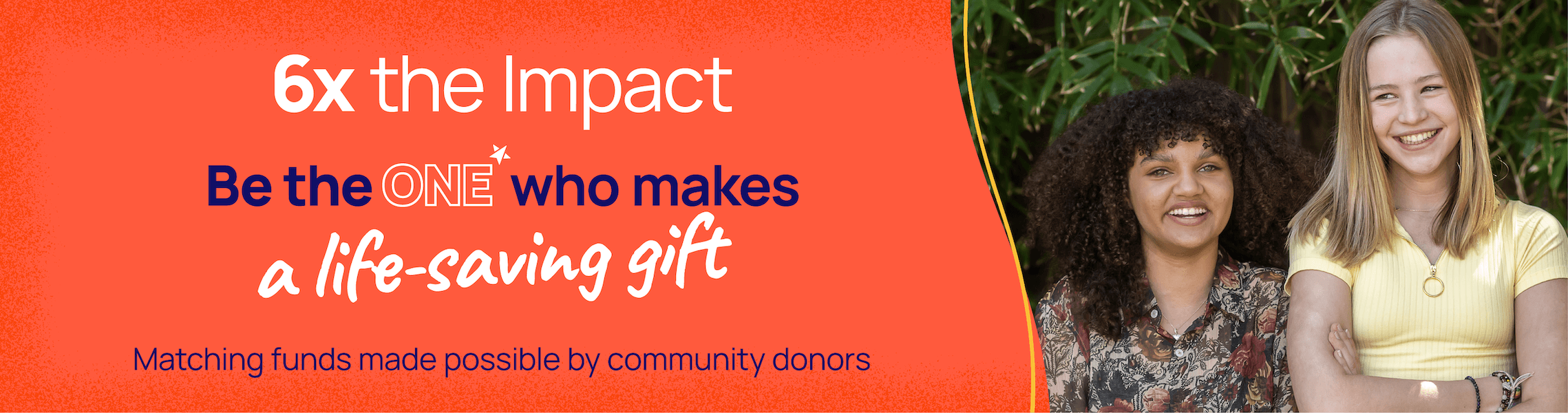 Two LGBTQ+ young people standing side-by-side in front of trees and smiling at the camera. Be the one who makes a life-saving gift.